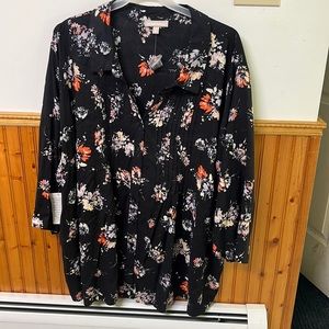 Woman within brand new black shirt/long sleeve  with flowered print